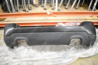 Бампер задний Kia Sportage 2004-2010 (под 2 трубы, без парктроника) (Уценка)