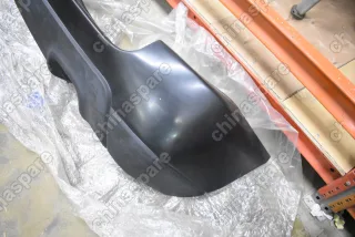 Бампер задний Kia Sportage 2004-2010 (под 2 трубы, без парктроника) (Уценка)