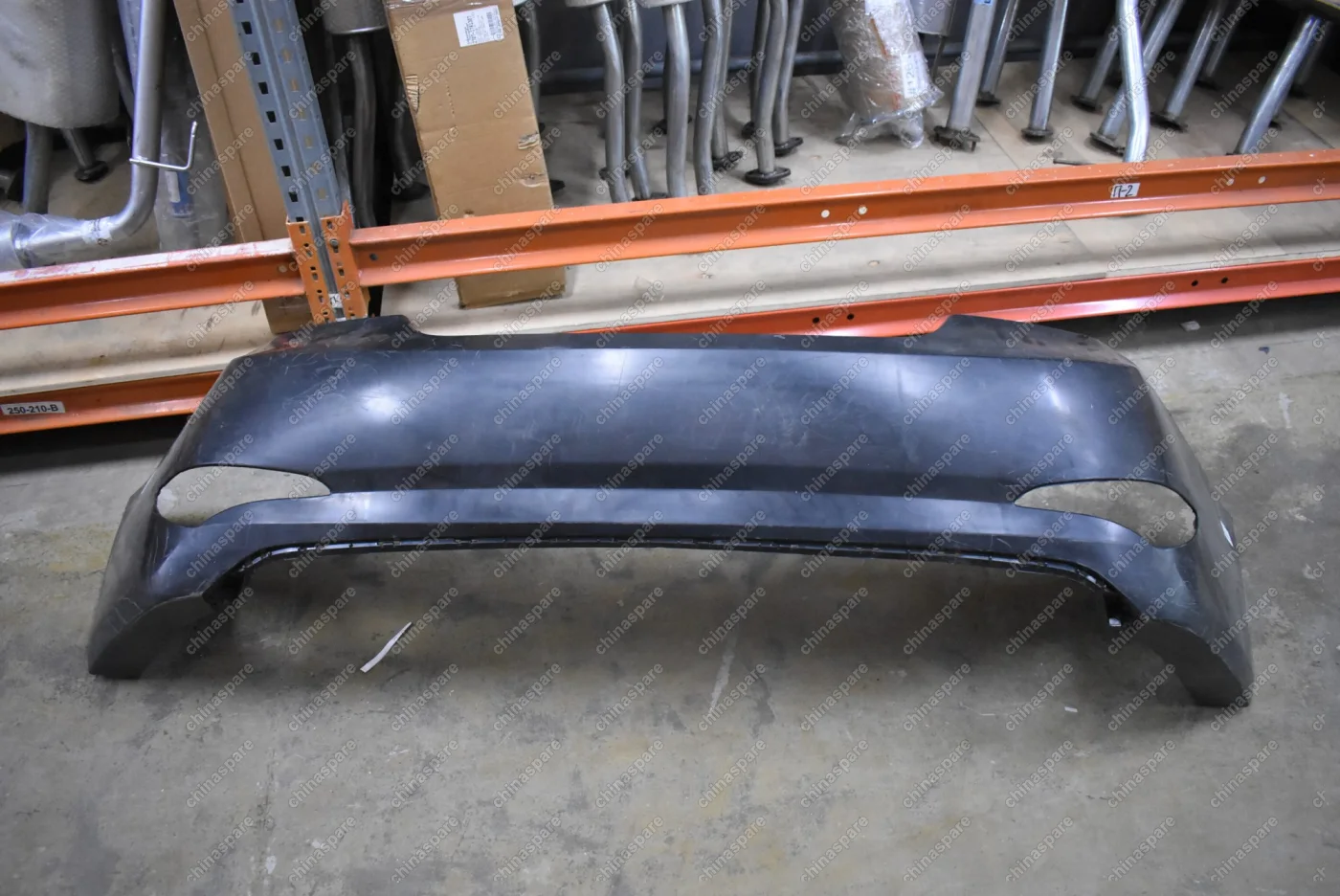 Бампер задний Hyundai Solaris 15- (без отверстий под парктроники) (уценка)