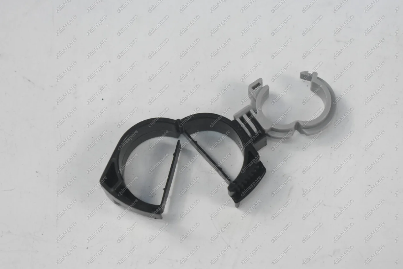 Фиксатор шланга расширительного бачка