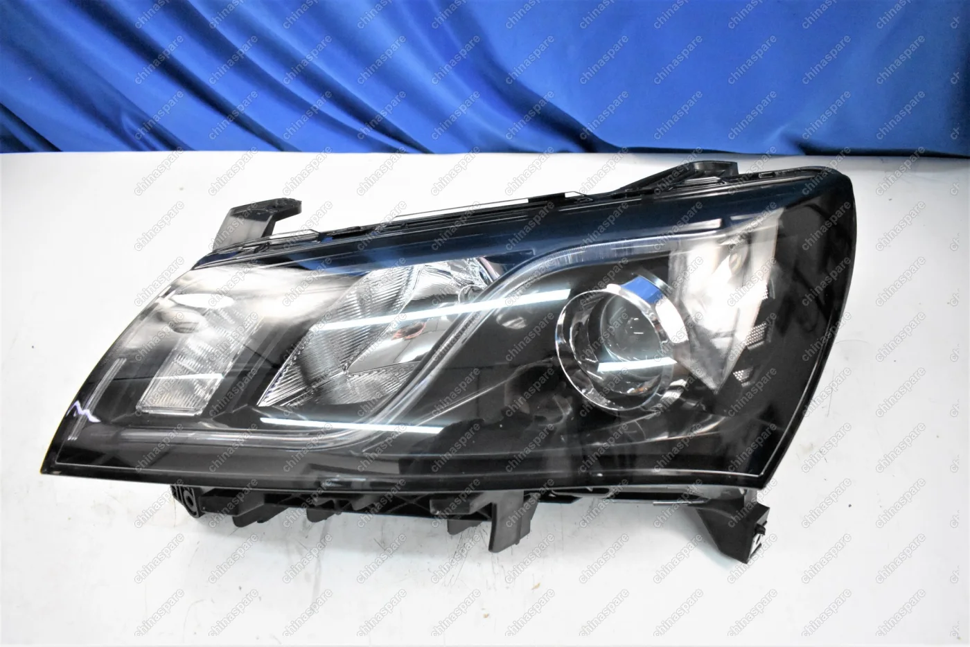 Фара головного света левая Geely Emgrand 7