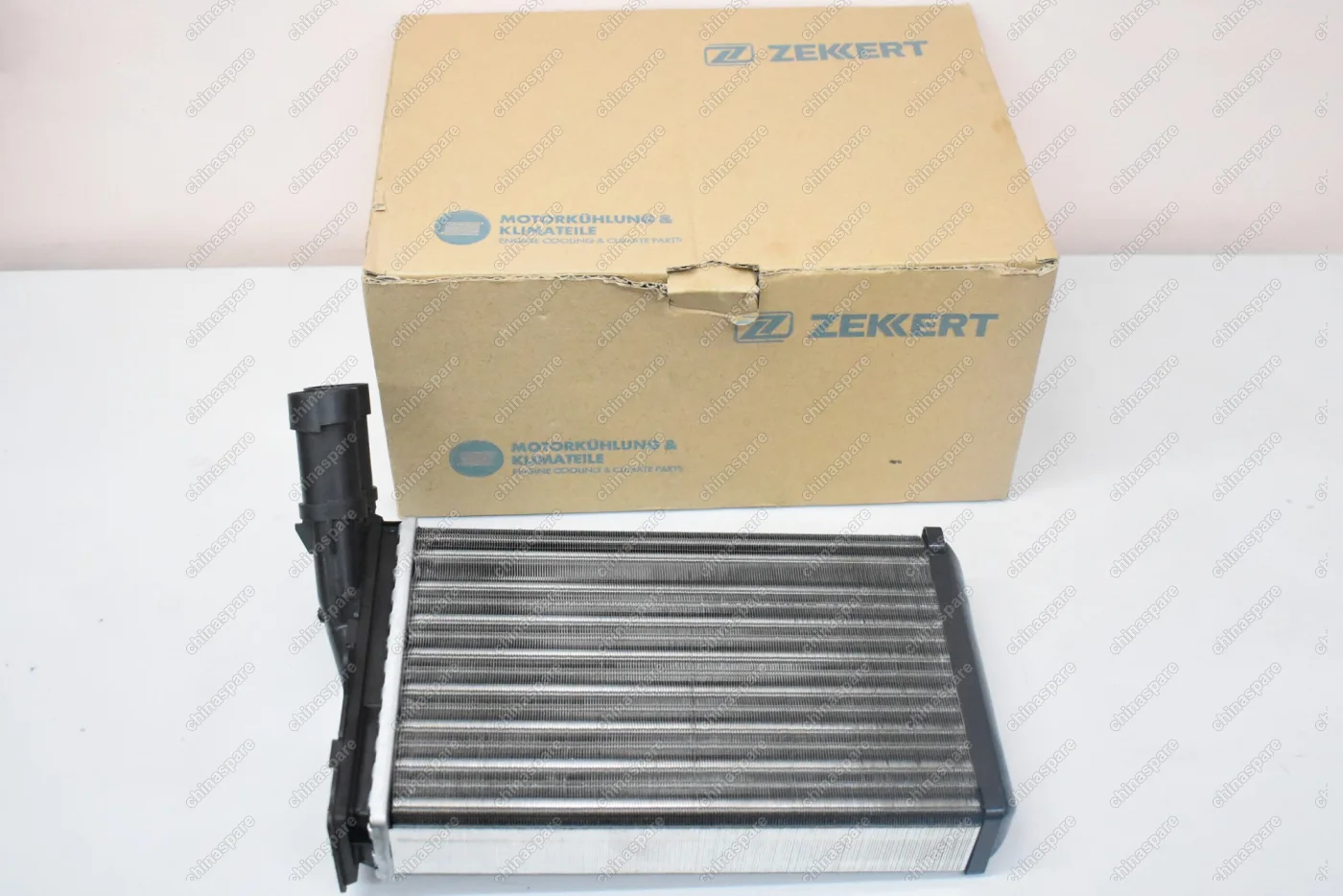 Радиатор отопителя «Zekkert» Citroen Berlingo 96-, Xsara 97- / Peugeot 306 94-, Partner 96--