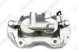 Суппорт тормозной передний левый Mitsubishi Pajero 90-00