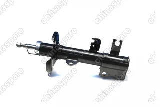 Амортизатор передний левый Trialli Geely Emgrand