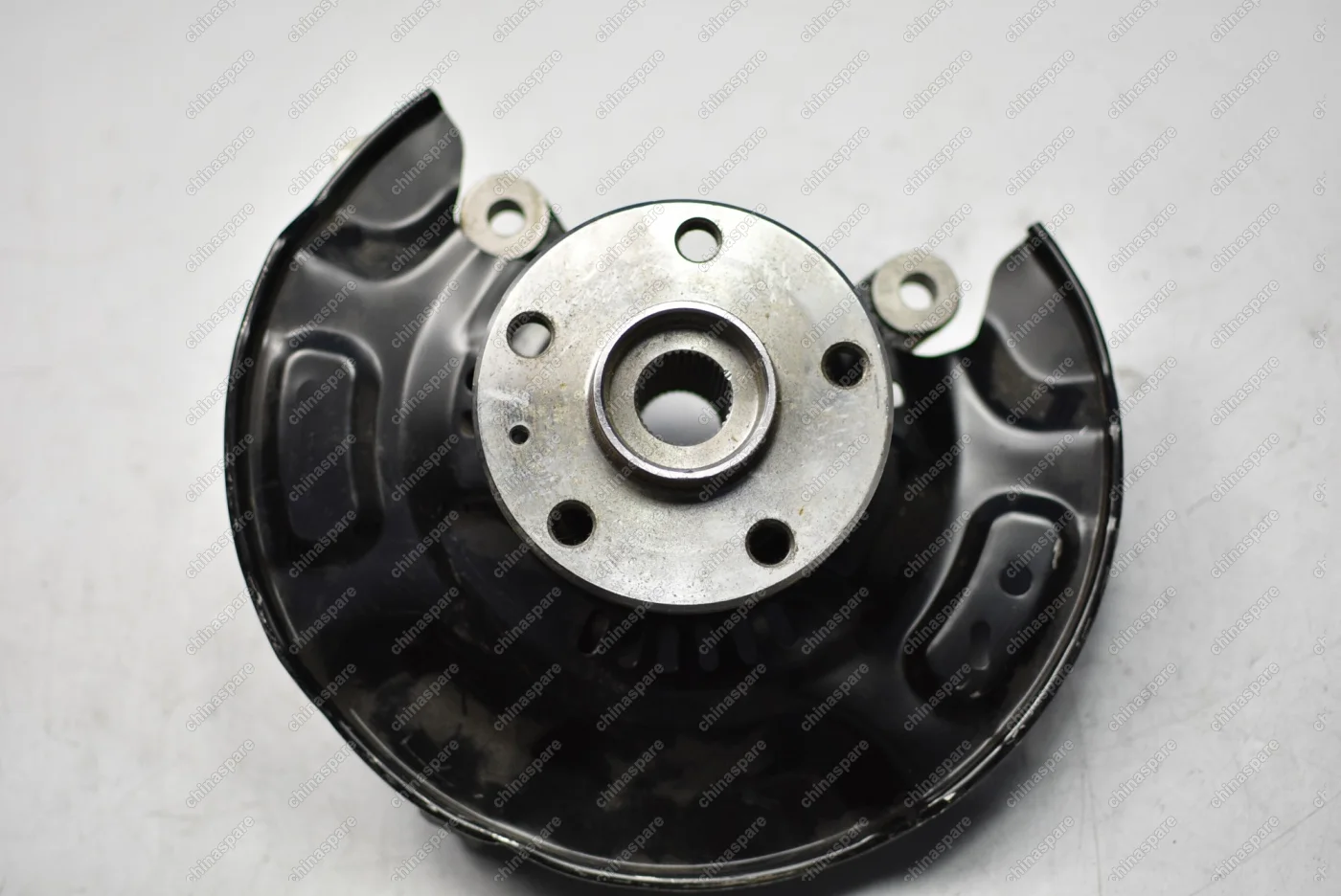 Кулак поворотный передний левый (с тормозным щитом и ступицей) Brilliance H230