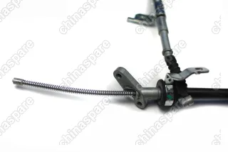 Трос стояночного тормоза левый Chery TIggo