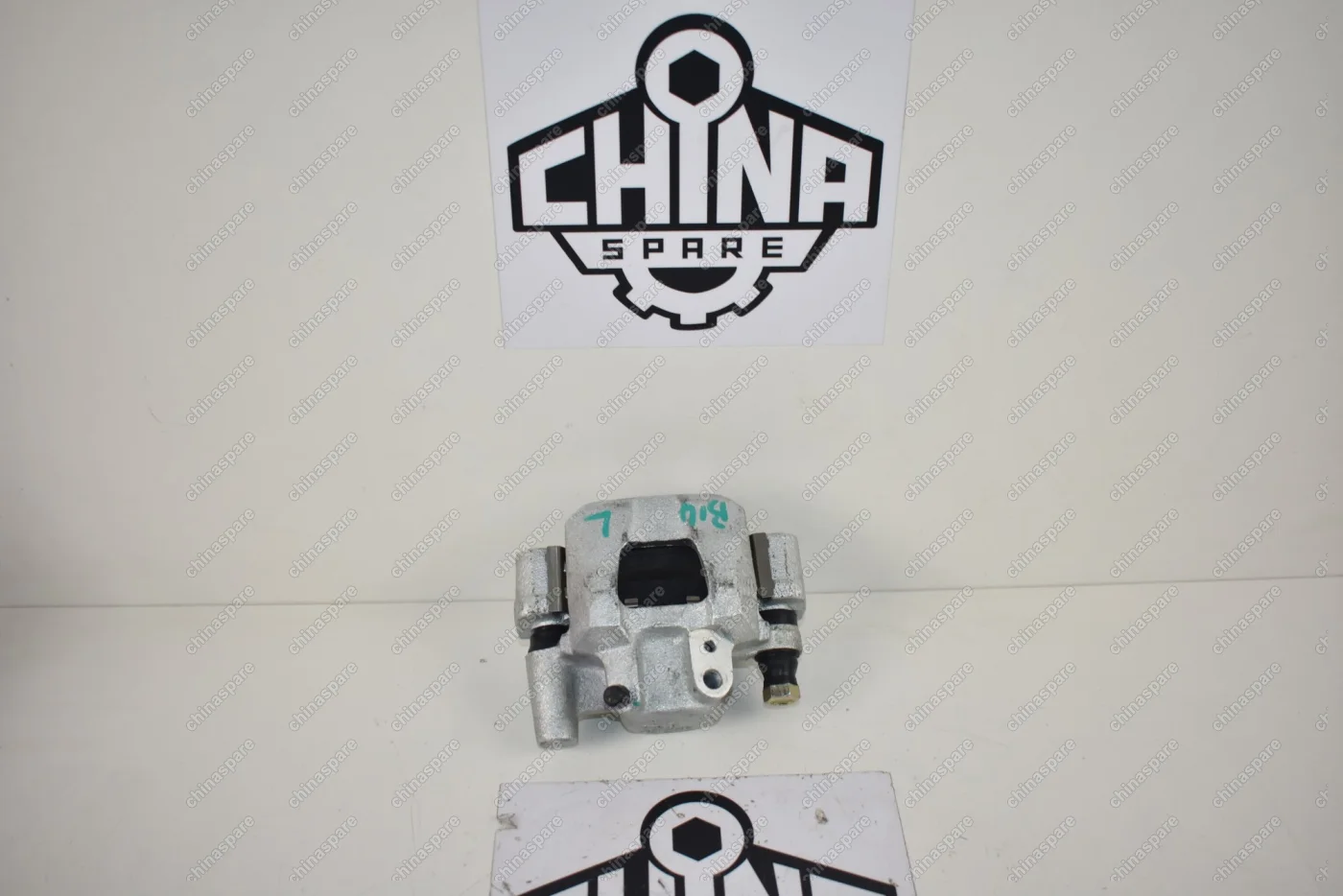 Суппорт тормозной задний левый Chery Cross Eastar