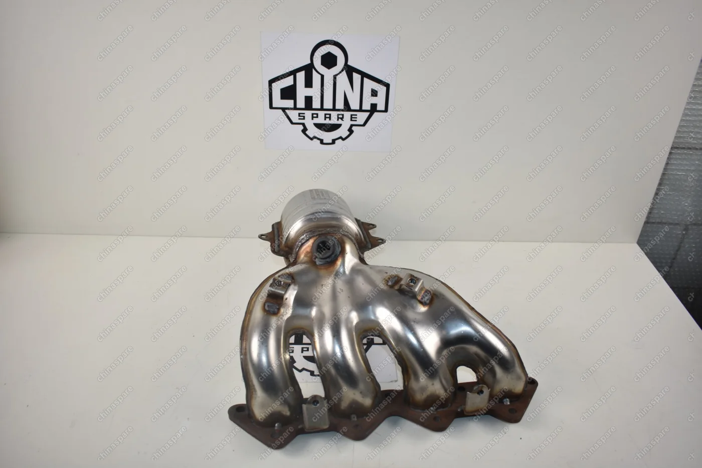 Коллектор выпускной с катализатором Chery Tiggo 2.4, Eastar 4G64