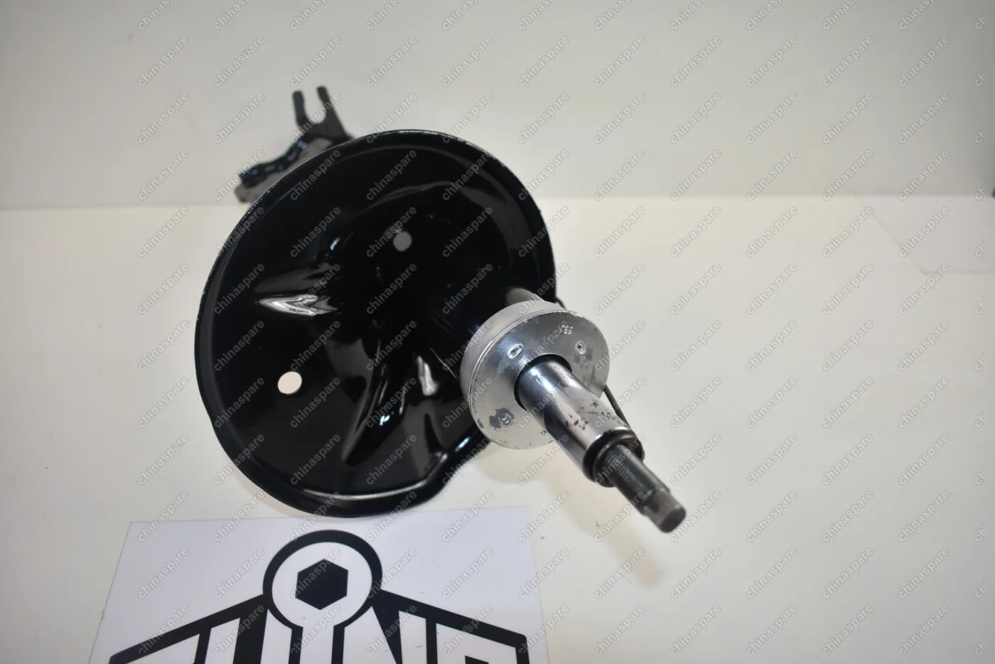 Амортизатор передний левый Chery M11/M12