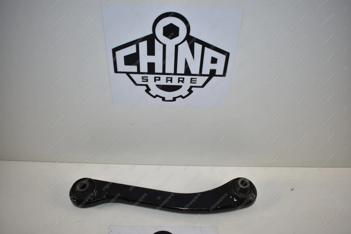 Рычаг задней подвески поперечный нижний левый (короткий) Chery M11