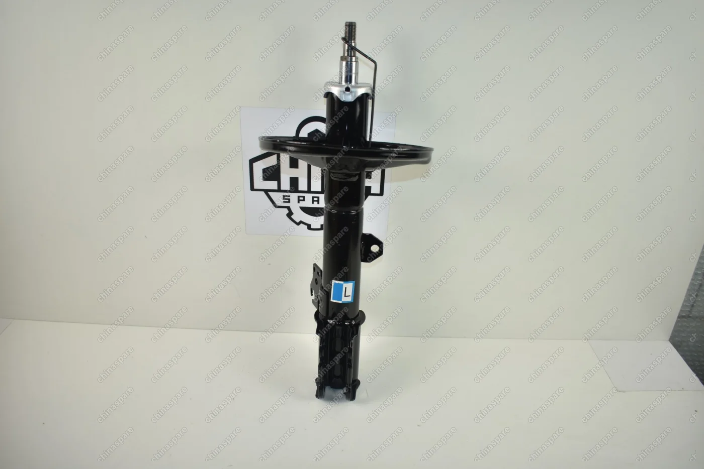 Амортизатор передний левый Chery Tiggo