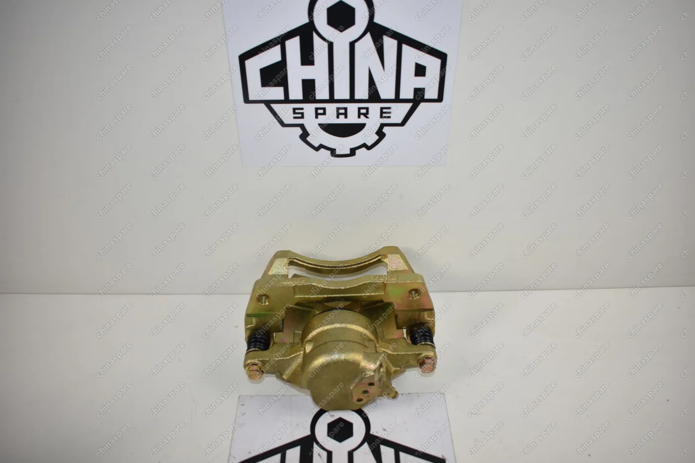 Суппорт тормозной передний левый Chery Tiggo