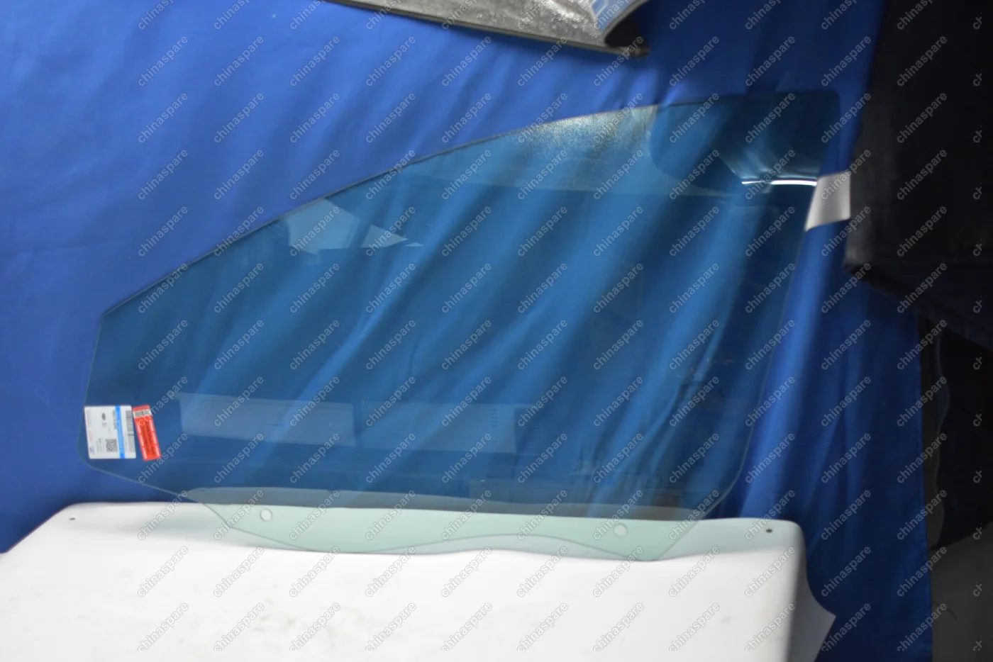 Стекло двери передней левой Geely Emgrand EC7