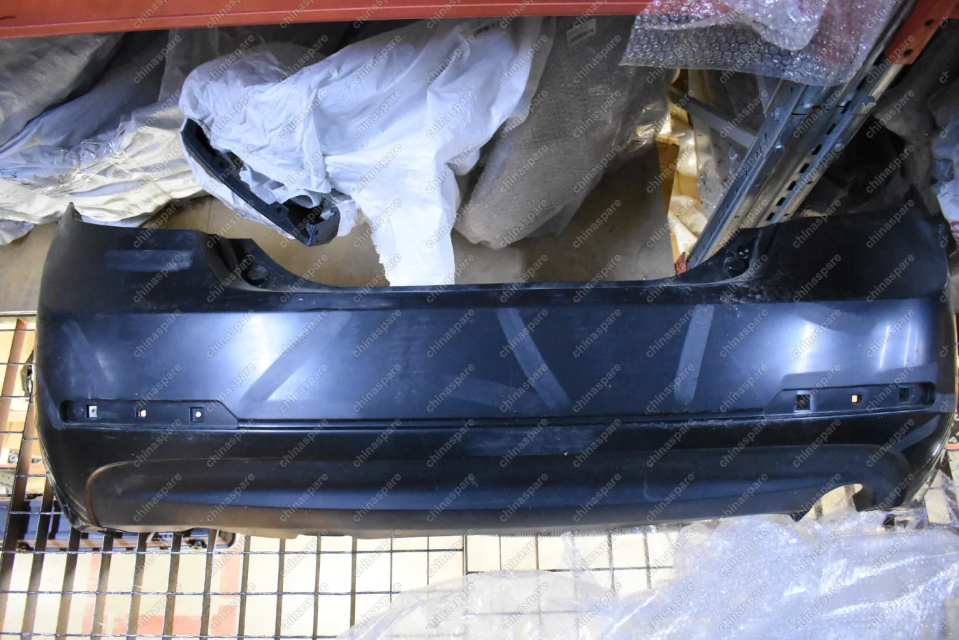 Бампер задний Geely Emgrand EC7