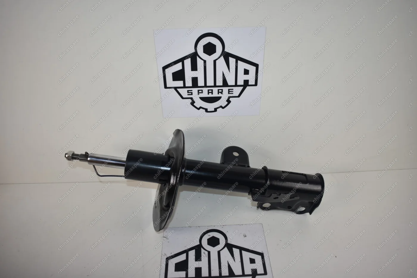 Амортизатор передний левый Geely Emgrand X7