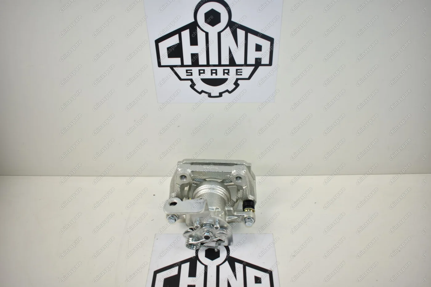 Суппорт тормозной задний левый Geely Emgrand X7