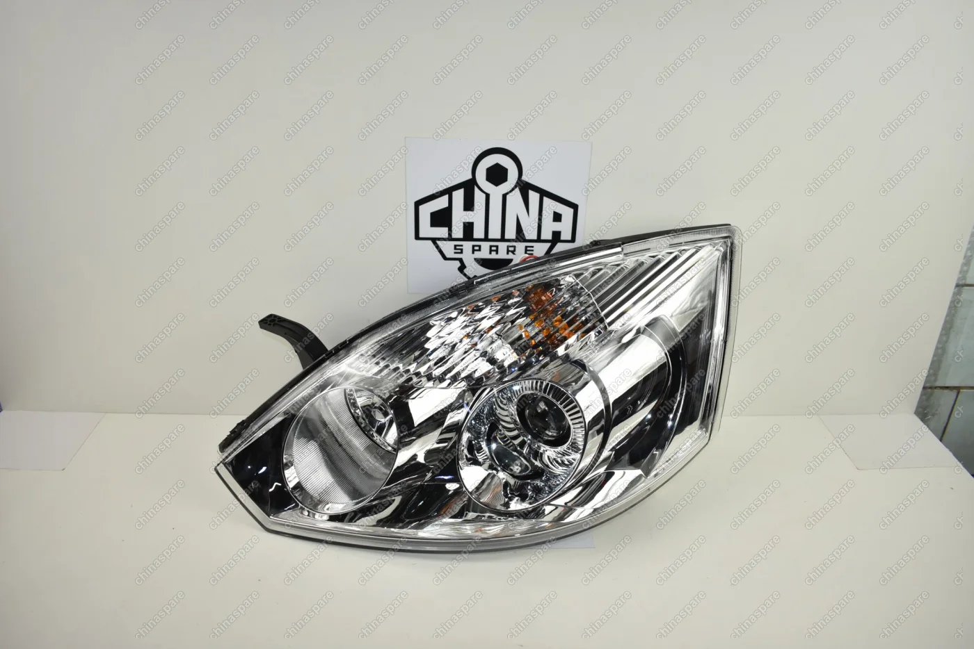 Фара головного света левая Geely Vision