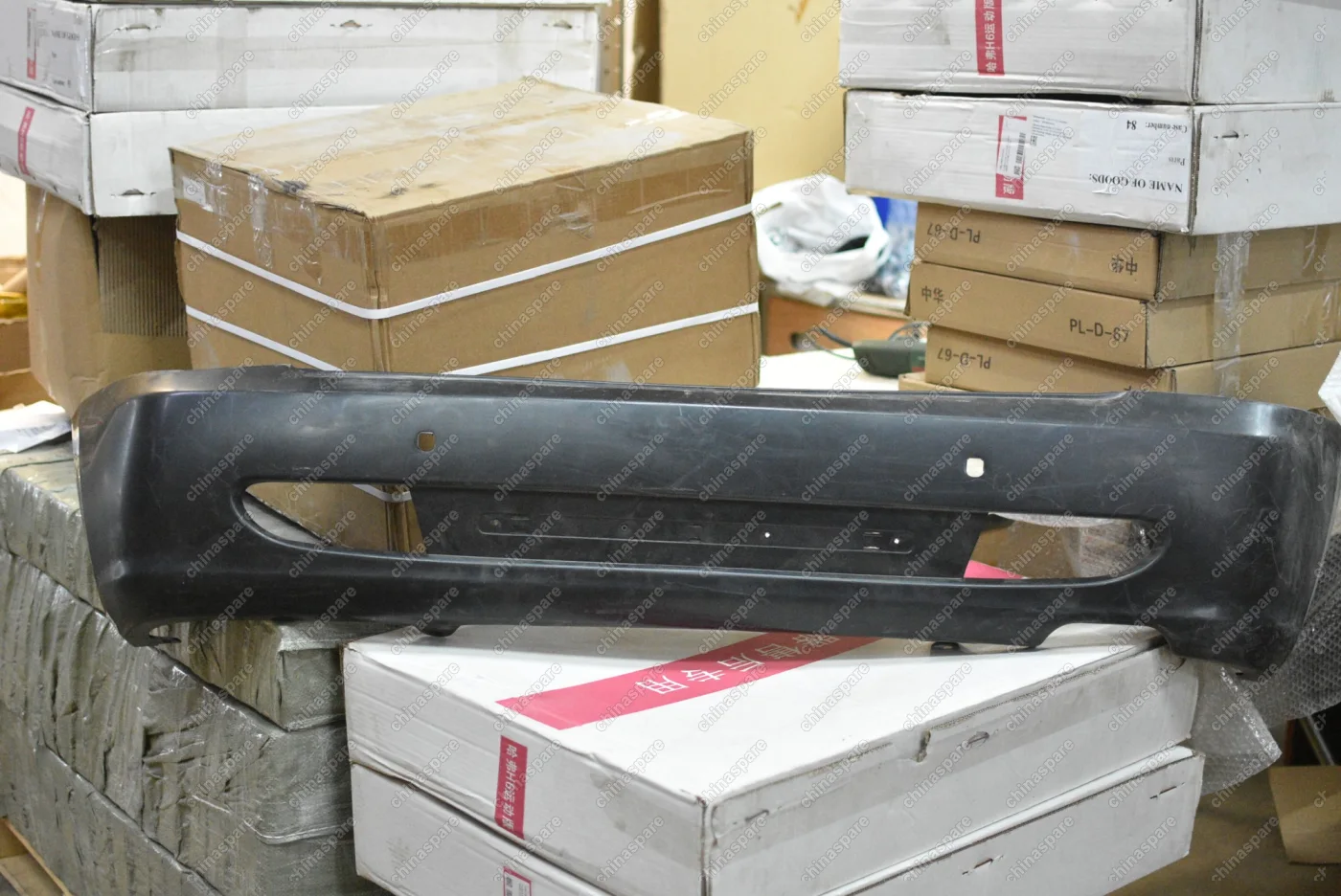 Бампер задний (под 2 датчика) Lifan Smily (уценка)