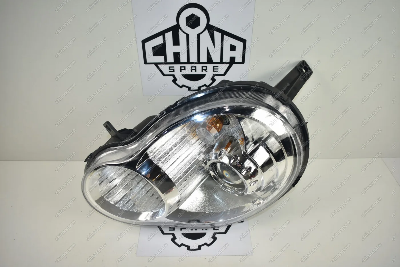 Фара головного света левая (с корректором) Lifan Smily