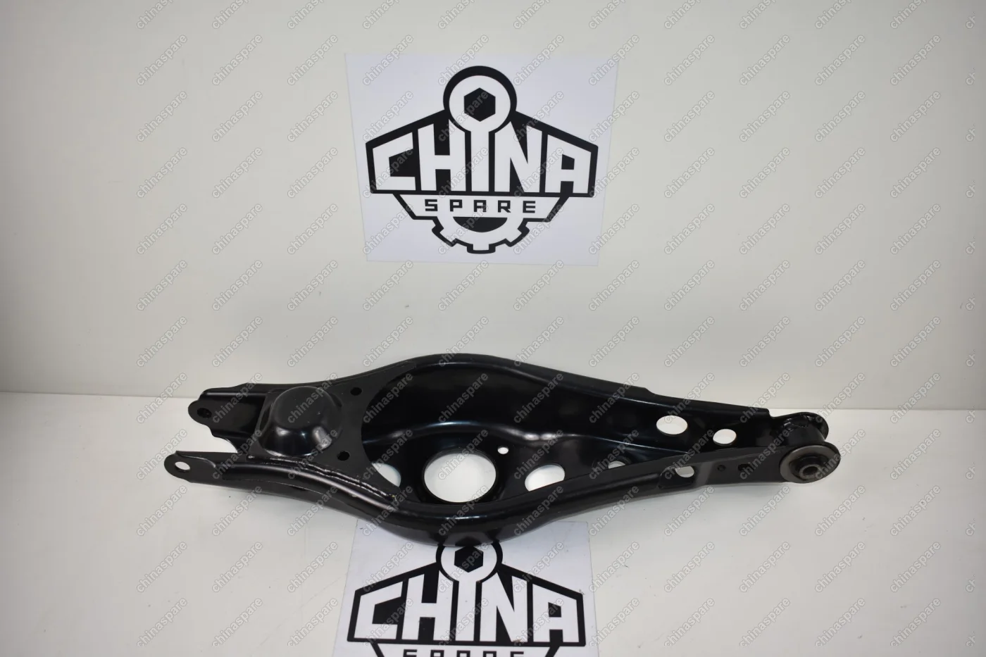 Рычаг задней подвески поперечный продольный (под пружину) левый Geely Emgrand X7