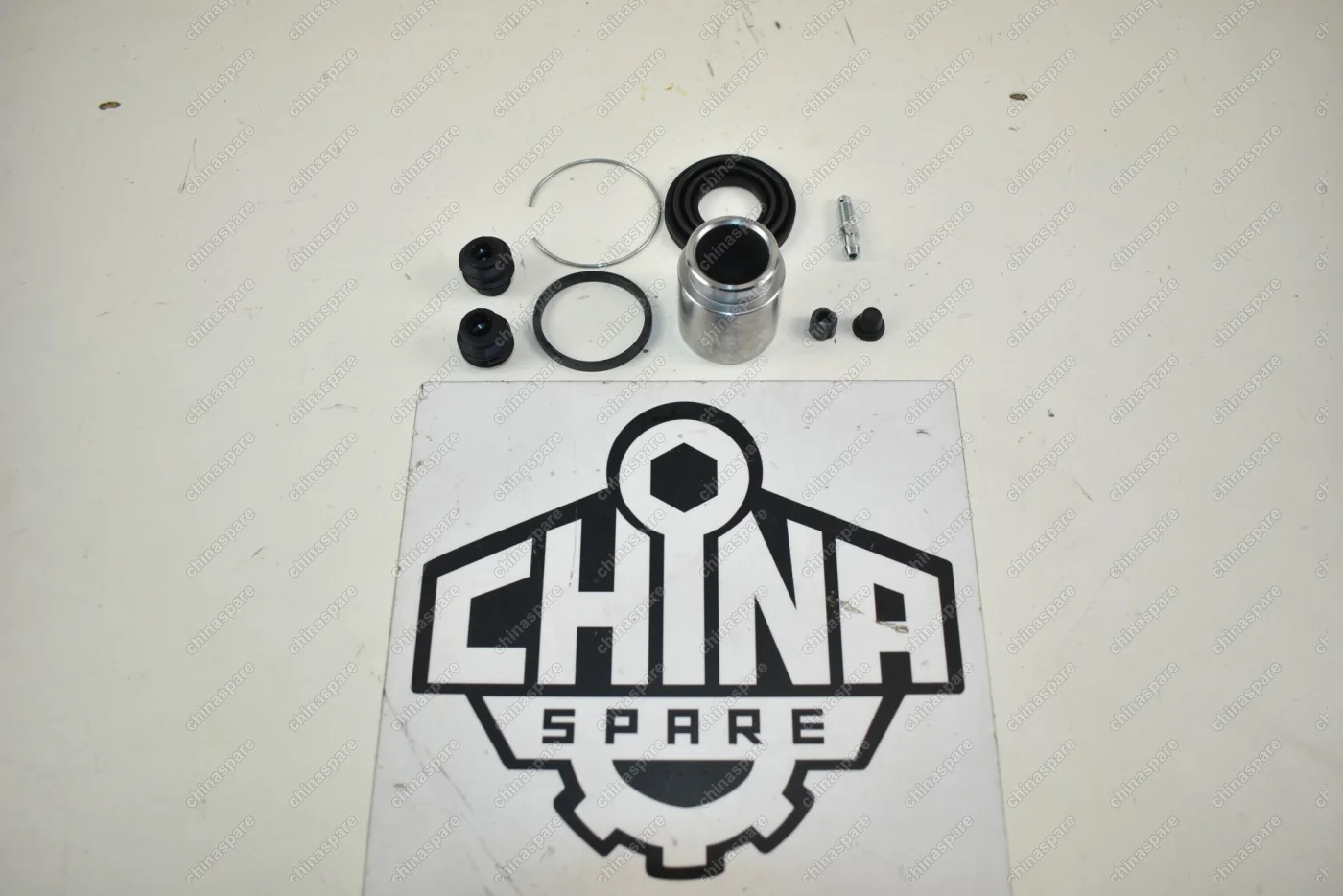 Ремкомплект суппорта заднего c поршнем LYNXauto Mitsubishi Outlander I-II, Lancer IX